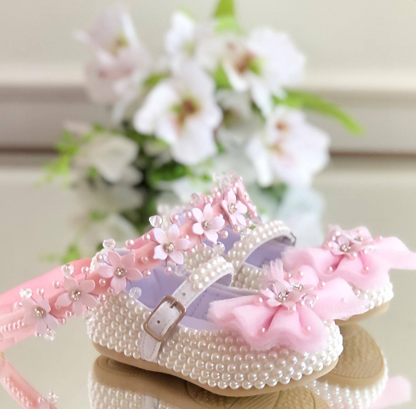White customised baby shoe