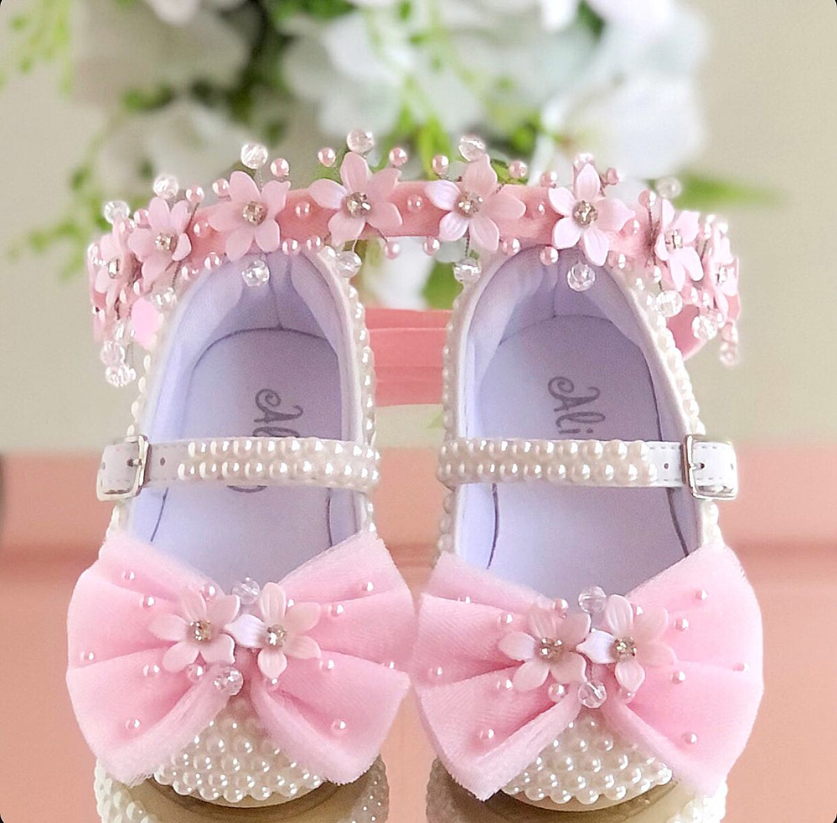White customised baby shoe