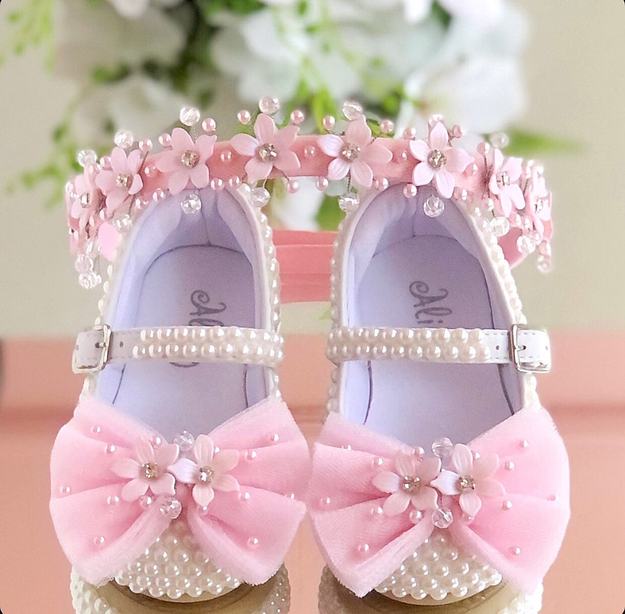 White customised baby shoe