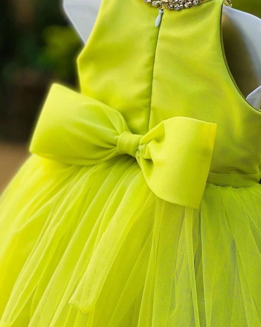 Classy Fluorescent Parrot Green Colour Baby Dress