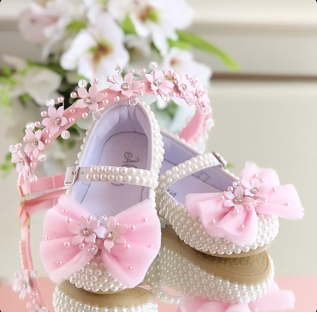 White customised baby shoe